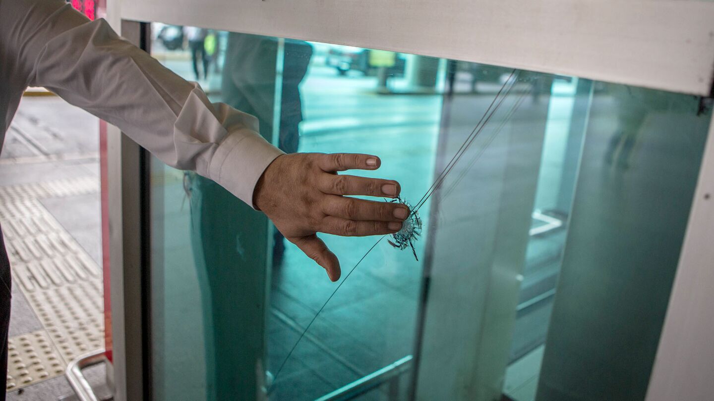 A window cracked by a bullet in Tuesday's attack at Istanbul's Ataturk Airport.