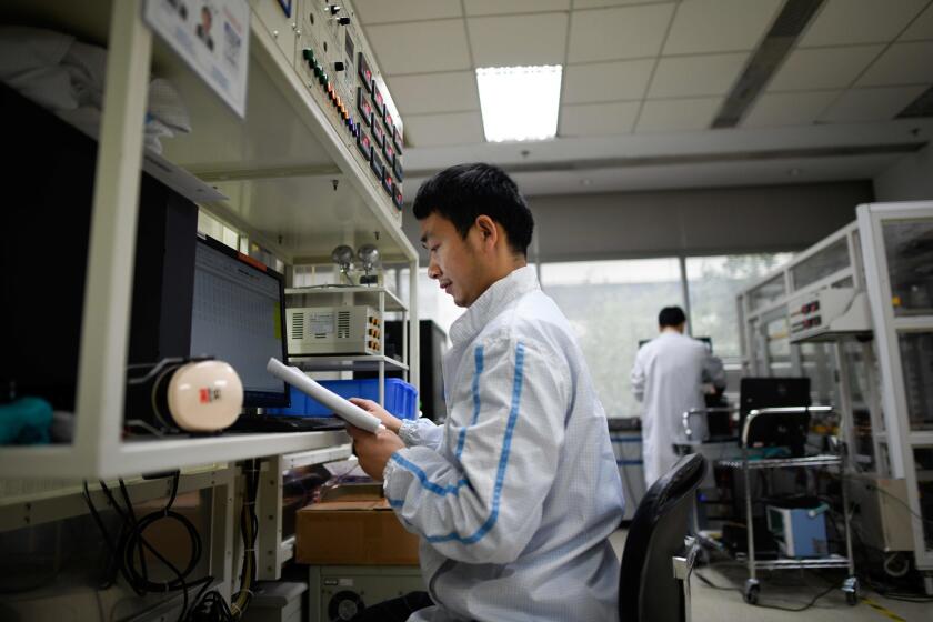 Staff members of Huawei work in the Huawei Thermal Lab in Shenzhen, China's Guangdong province on March 6, 2019. - Chinese telecom giant Huawei insisted on March 6 its products feature no security "backdoors" for the government, as the normally secretive company gave foreign media a peek inside its state-of-the-art facilities. (Photo by WANG ZHAO / AFP)WANG ZHAO/AFP/Getty Images ** OUTS - ELSENT, FPG, CM - OUTS * NM, PH, VA if sourced by CT, LA or MoD **