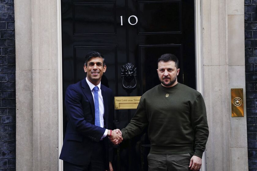 Britain's Prime Minister Rishi Sunak, left, welcomes Ukraine's President Volodymyr Zelenskyy at Downing Street in London, Wednesday, Feb. 8, 2023. It is the first visit to the UK by the Ukraine President since the war began nearly a year ago. (Victoria Jones/PA via AP)