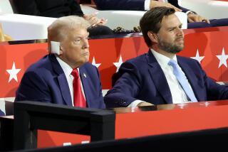 MILWAUKEE, WI JULY 15, 2024 -- Former US President Donald Trump, left, and J.D. Vance during the first day of the Republican National Convention at Milwaukee, WI on Monday, July 15, 2024. (Jason Armond / Los Angeles Times)
