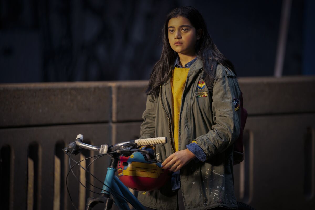 a girl with her bicycle