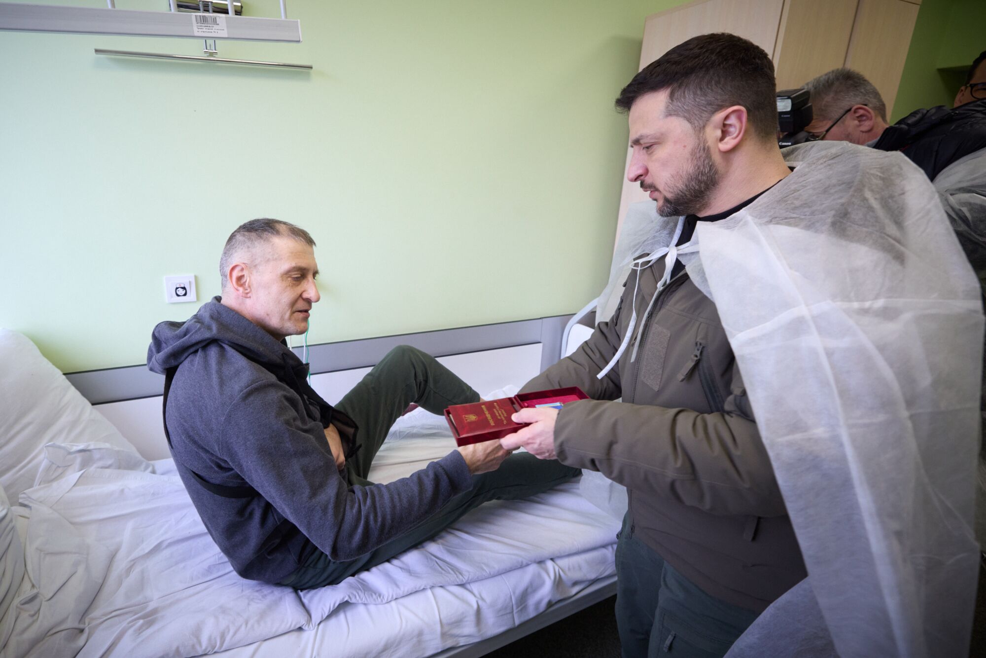 Ukrainian President Volodymyr Zelenskyy visits injured soldiers to hand out medals