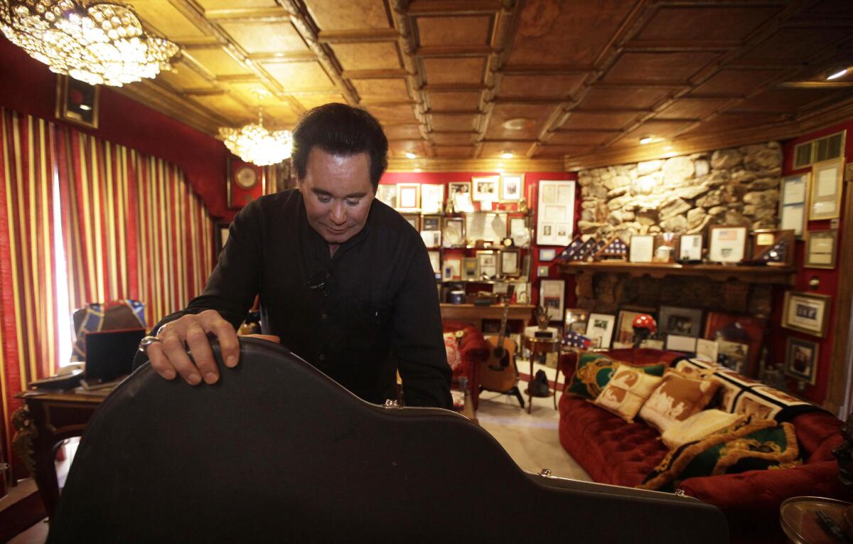 Wayne Newton in 2010 displays some of his personal memorabilia in his office, called the Red Room.