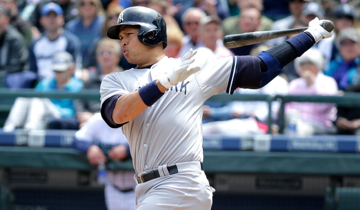 New York Yankees' Alex Rodriguez takes a swing against the Seattle Mariners during a game on Wednesday.