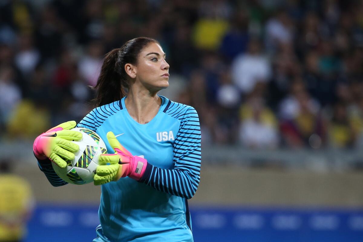 United States goalkeeper Hope Solo takes the ball during an Olympic match against New Zealand at the Mineirao Stadium in Belo Horizonte, Brazil on Aug. 3.