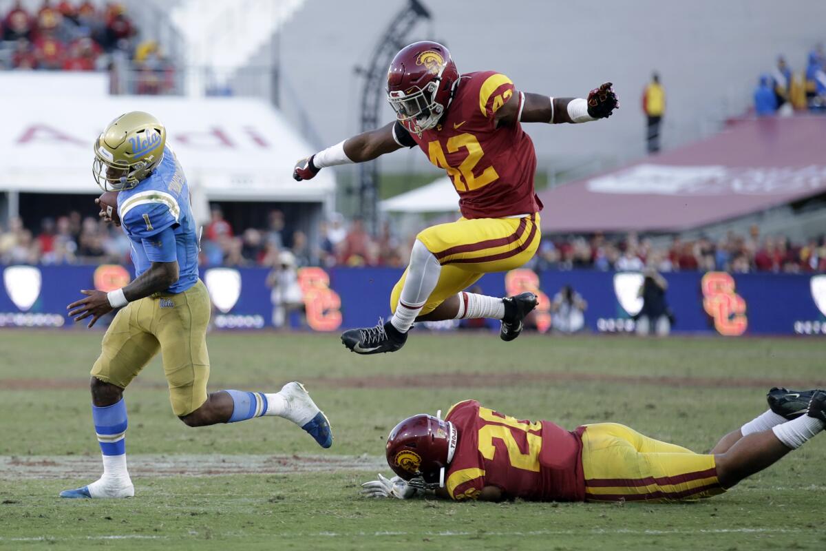 The UCLA and USC football teams square off at the L.A. Memorial Coliseum in 2019. 