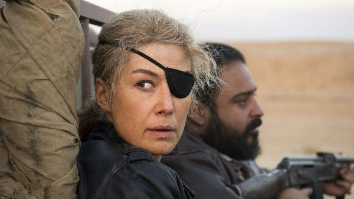 Rosamund Pike in a scene from "A Private War."