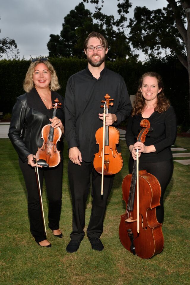 Angelica Strings musicians Missy Lukin (violin), Greg Perrin (viola) and Amanda Devlin (cello)