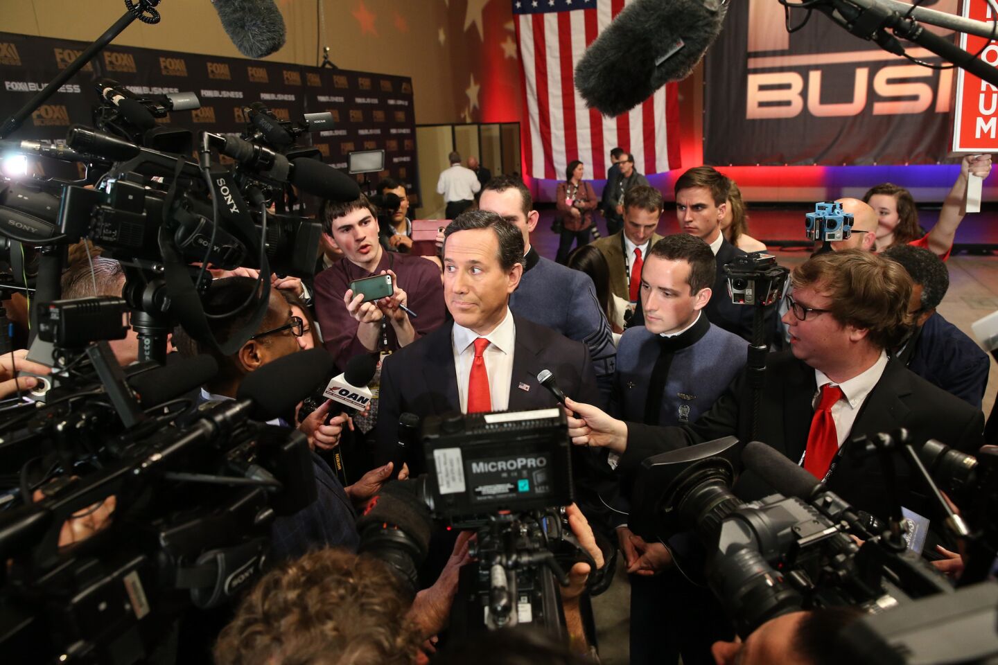 Rick Santorum speaks to reporters.