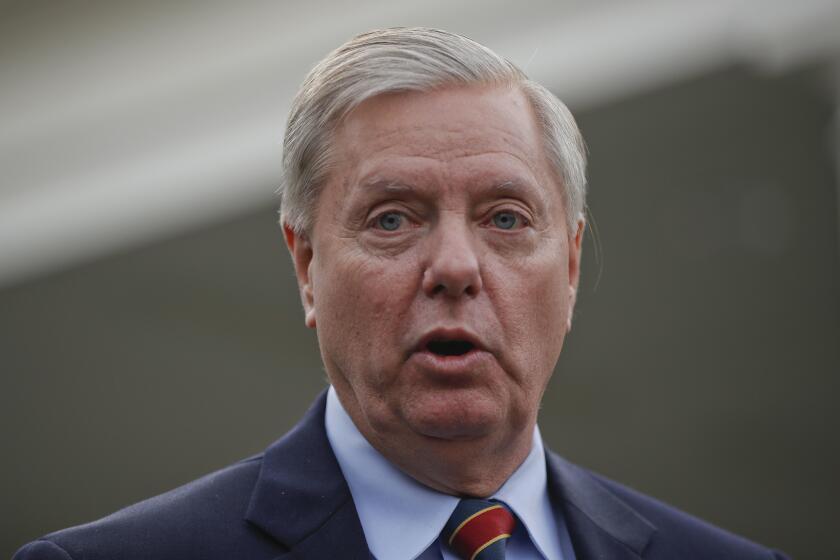 Sen. Lindsey Graham, R-S.C., speaks to members of the media outside the West Wing of the White House in Washington, after his meeting with President Donald Trump, Sunday, Dec. 30, 2018. (AP Photo/Pablo Martinez Monsivais)