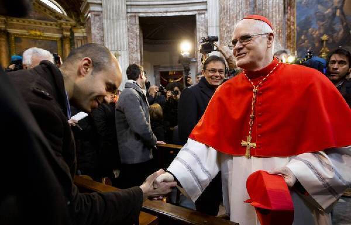 Cardinal Odilo Pedro Scherer of Brazil arrives to celebrate Mass at the Sant'Andrea al Quirinale church in Rome on Sunday. He is seen as a leading candidate to be pope.