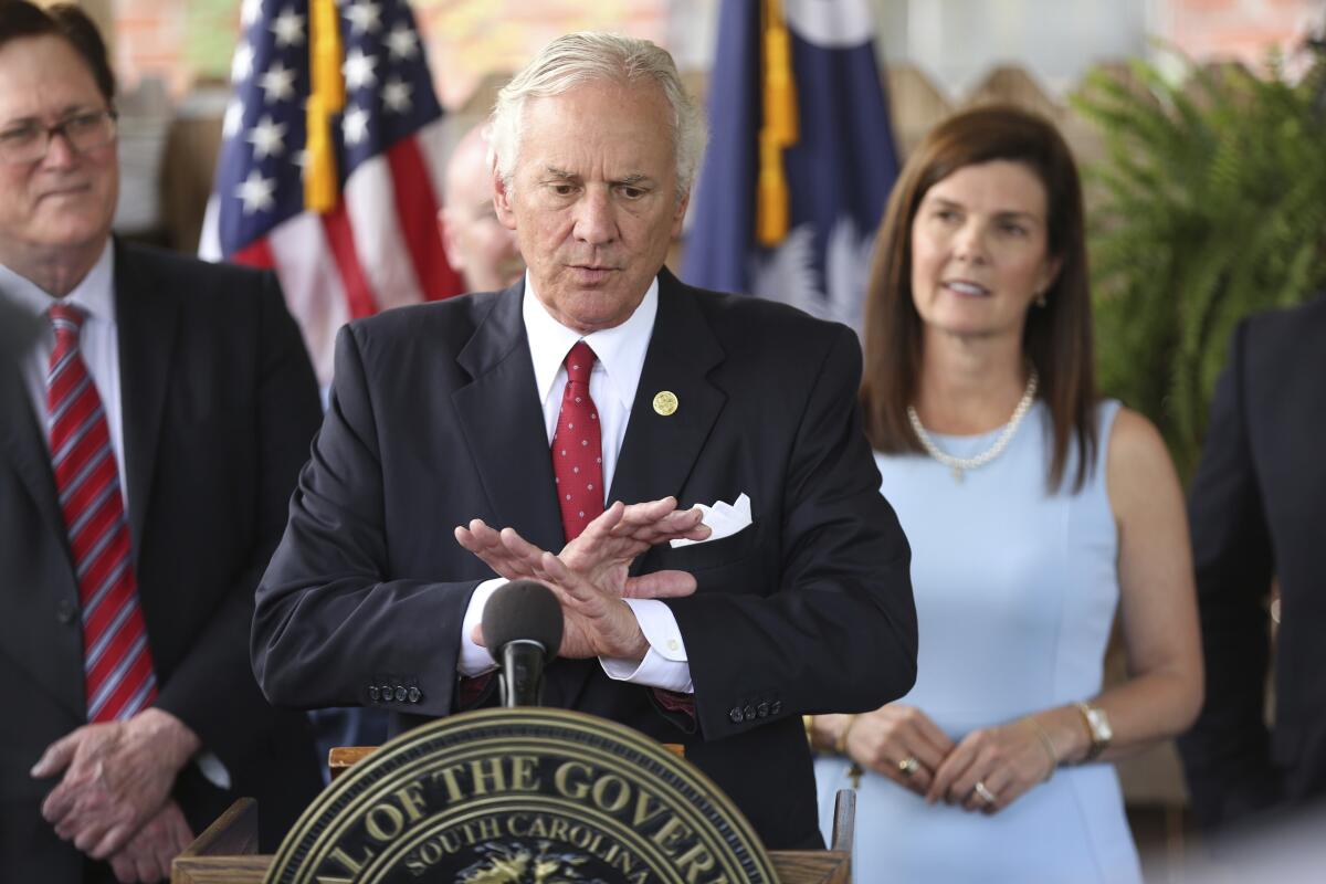 South Carolina Gov. Henry McMaster speaks at a lectern.