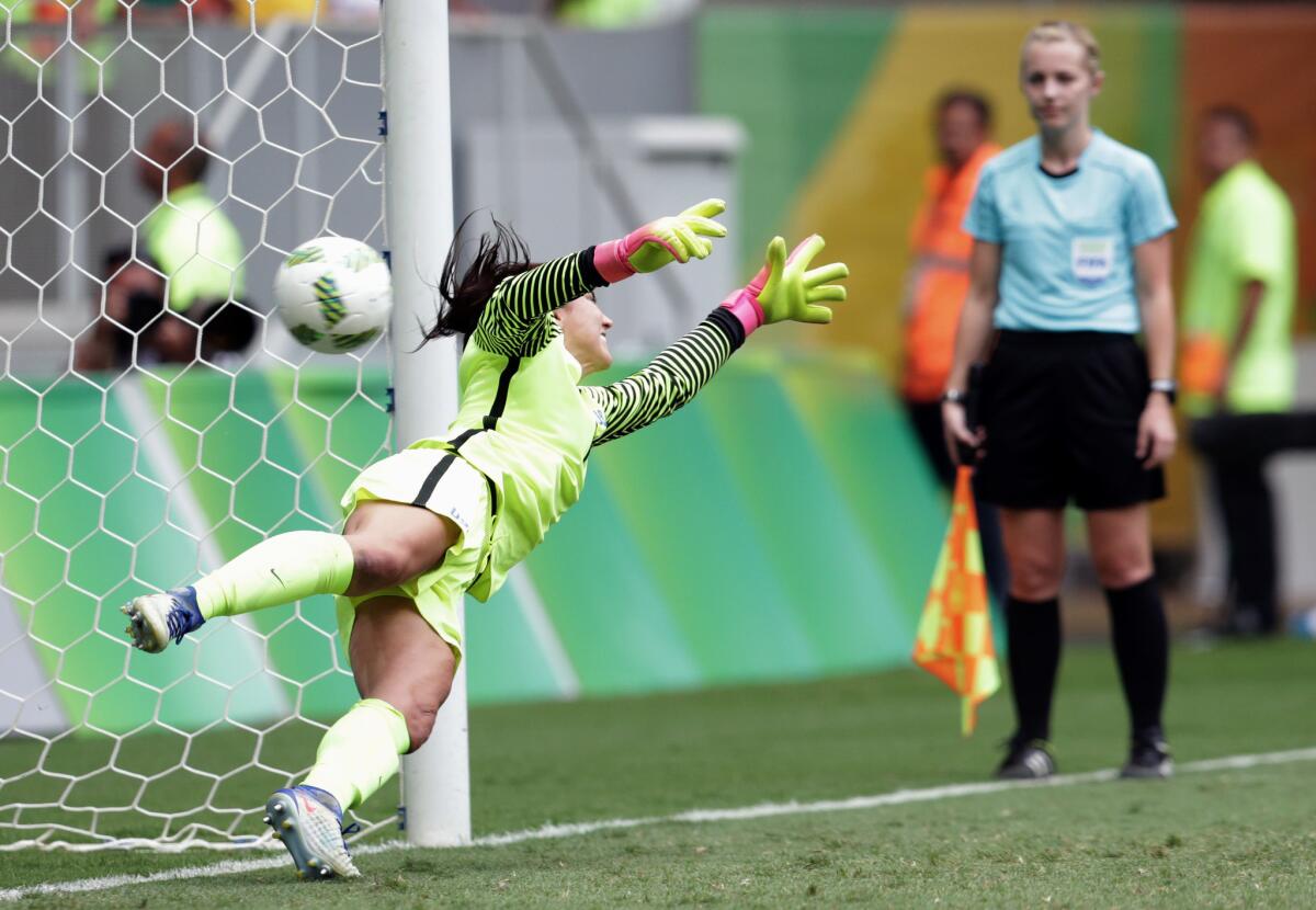 U.S. goalkeeper Hope Solo is beaten on a shot during the shootout against Sweden.