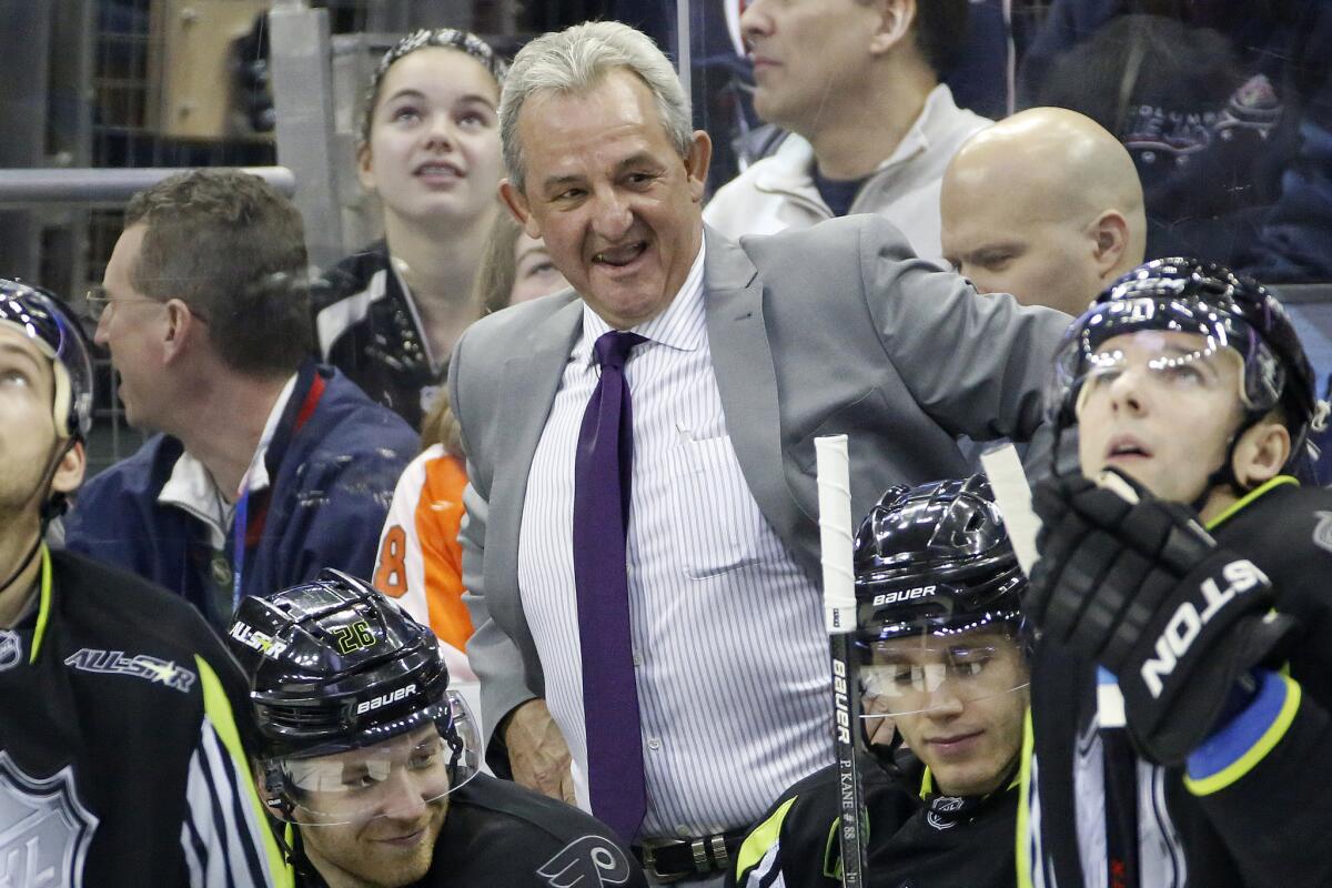 Kings Coach Darryl Sutter smiles during the NHL All-Star game. Sutter and the Kings are being featured on the "Road to the Stadium Series" four-episode documentary series.