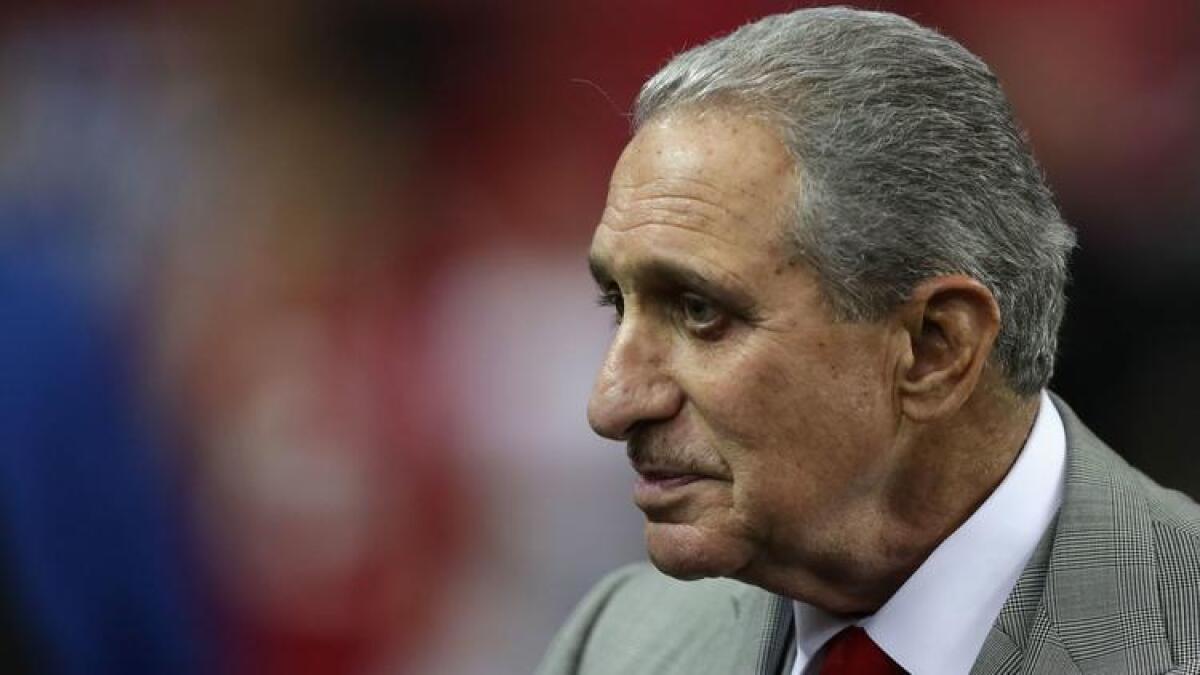 Atlanta Falcons owner Arthur Blank watches the team warm up before a Jan. 14 game against Seattle.