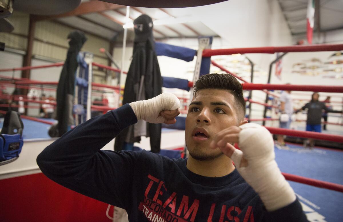 Carlos Balderas hits a speed bag during a training session at his hometown gym in Santa Maria.