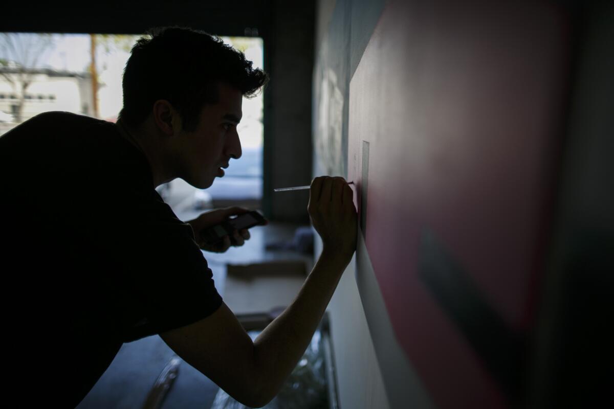 Gomez at work in his studio.