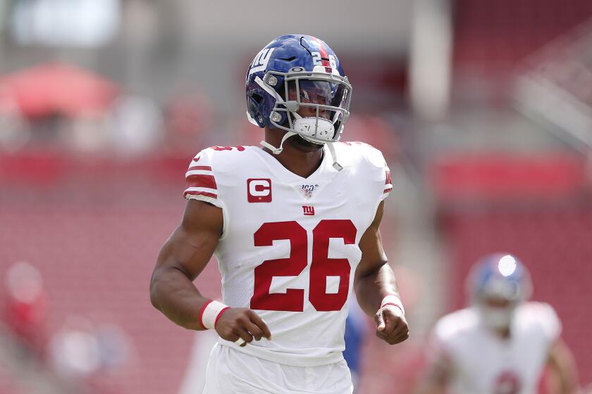 TAMPA, FLORIDA - SEPTEMBER 22: Saquon Barkley #26 of the New York Giants warms up prior to the game at Raymond James Stadium on September 22, 2019 in Tampa, Florida. (Photo by Michael Reaves/Getty Images)