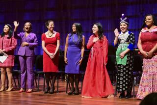 St. Paul City Council members, from left, Mitra Jalali, Anika Bowie, Rebecca Noecker, Saura Jost, HwaJeong Kim, Nelsie Yang and Chenique Johnson are introduced at the start of the inauguration ceremony for St. Paul City Council members in St. Paul, Minn. on Tuesday, Jan. 9, 2024. The youngest and most diverse city council in the history of Minnesota's capital city was sworn into office Tuesday, officially elevating the first all-female St. Paul City Council into public service at City Hall. (John Autey /Pioneer Press via AP)