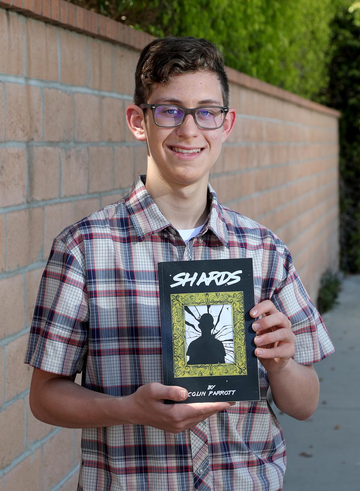 Huntington Beach High School junior Colin Parrott, 16, self-published a poetry book that was written over a two-month period.