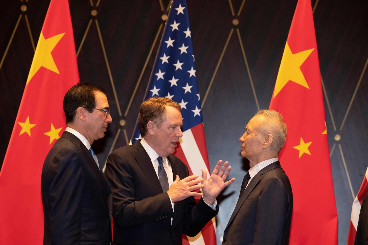 U.S. Trade Representative Robert Lighthizer, center, and Treasury Secretary Steven T. Mnuchin, left, met with Chinese Vice Premier Liu He in Shanghai on July 31.