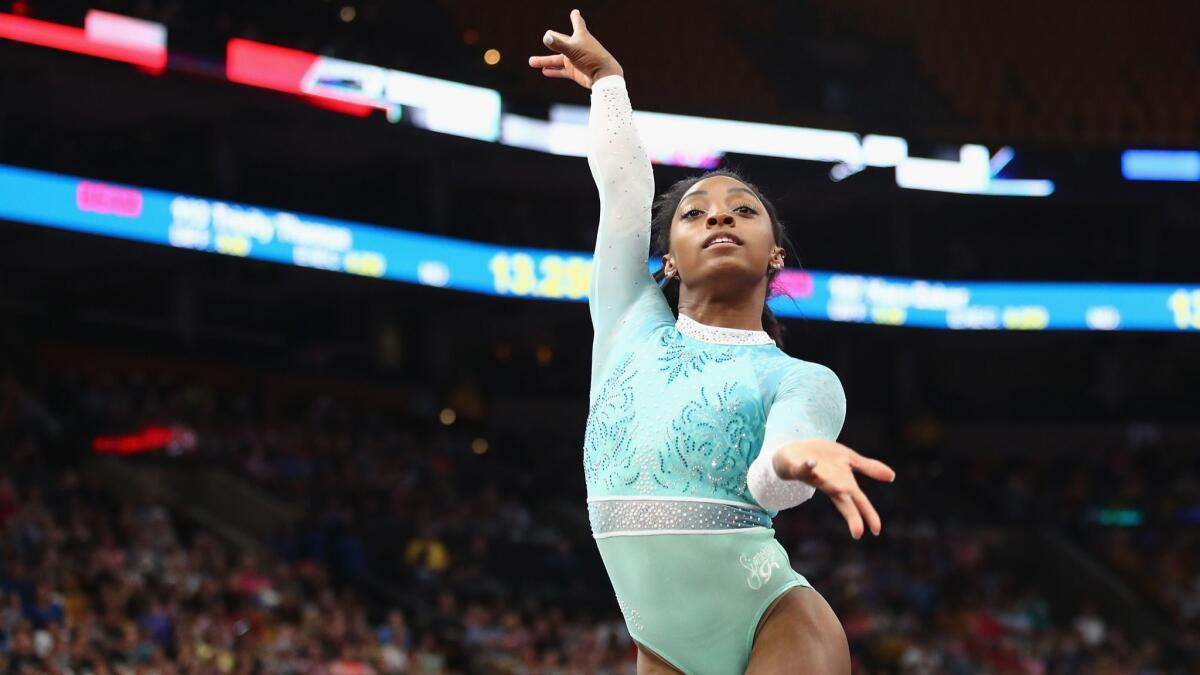 Simone Biles performs her floor exercise at the U.S. women's gymnastics championships 2018 on Sunday in Boston.