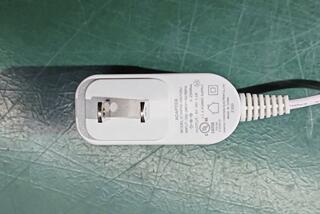 This photo provided by the U.S. Consumer Product Safety Commission shows an example of a power adapter sold with the Rest 1st Generation sound machine being recalled Wednesday, July 3, 2024. Hatch Baby is recalling nearly 1 million power adapters sold with sound machines marketed to help infants and young children sleep due to a shock hazard.