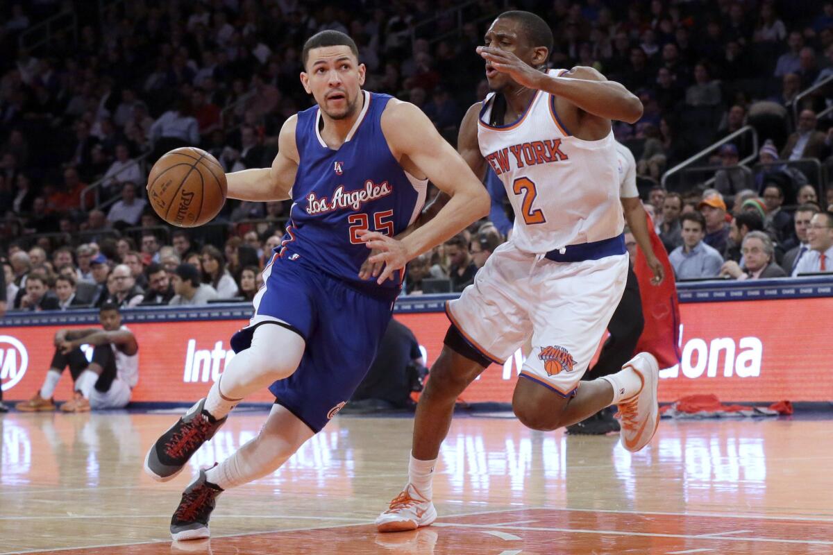 Clippers guard Austin Rivers drives down the lane against Knicks guard Langston Galloway in the first half Wednesday night at Madison Square Garden.