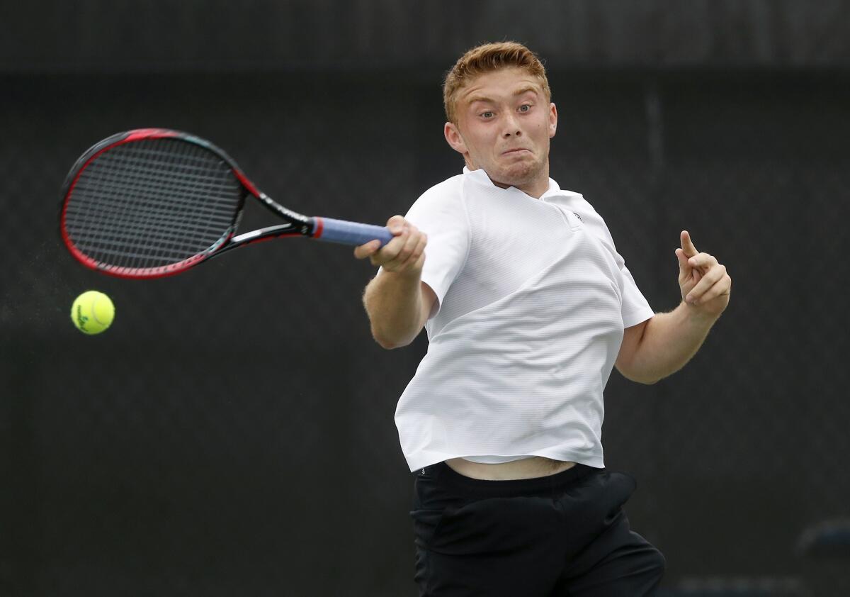 Sage Hill School No. 2 singles player Steven Ferry returns the ball against Ventura in the semifinals of the CIF Southern Section Division 1 playoffs at home on Wednesday.