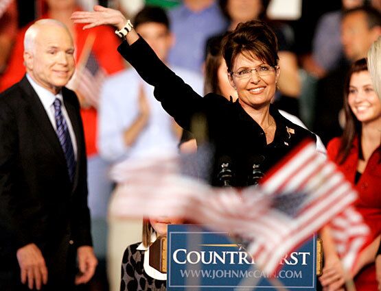Republican Alaska Gov. Sarah Palin acknowledges supporters at the rally where Republican presidential candidate John McCain introduced her as his running mate. "I have found the right partner to help me stand up to those who value their privileges over their responsibilities," McCain said at the rally in Dayton, Ohio.