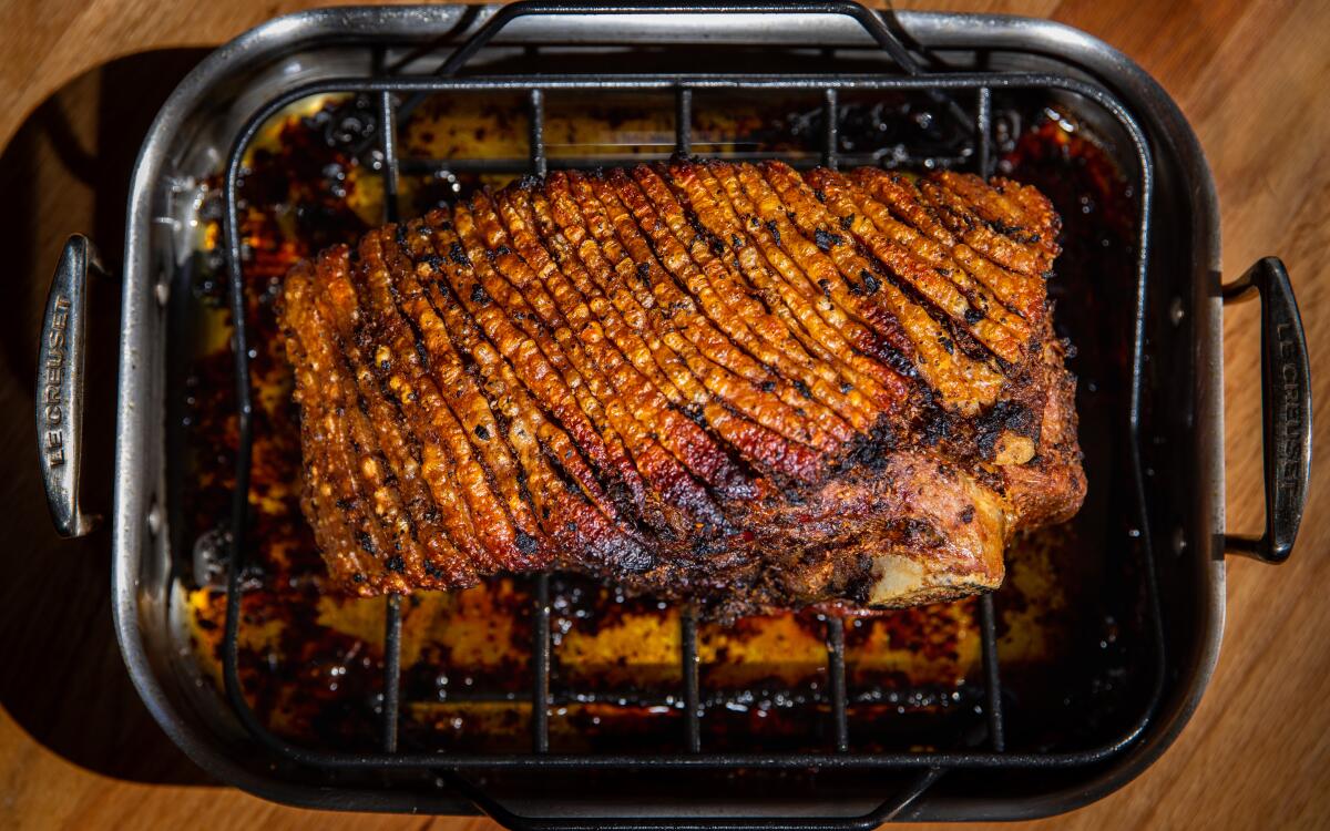 Striations of crisp crackling top this pork shoulder with fennel seeds and pollen, lemon zest, garlic and chile flakes.