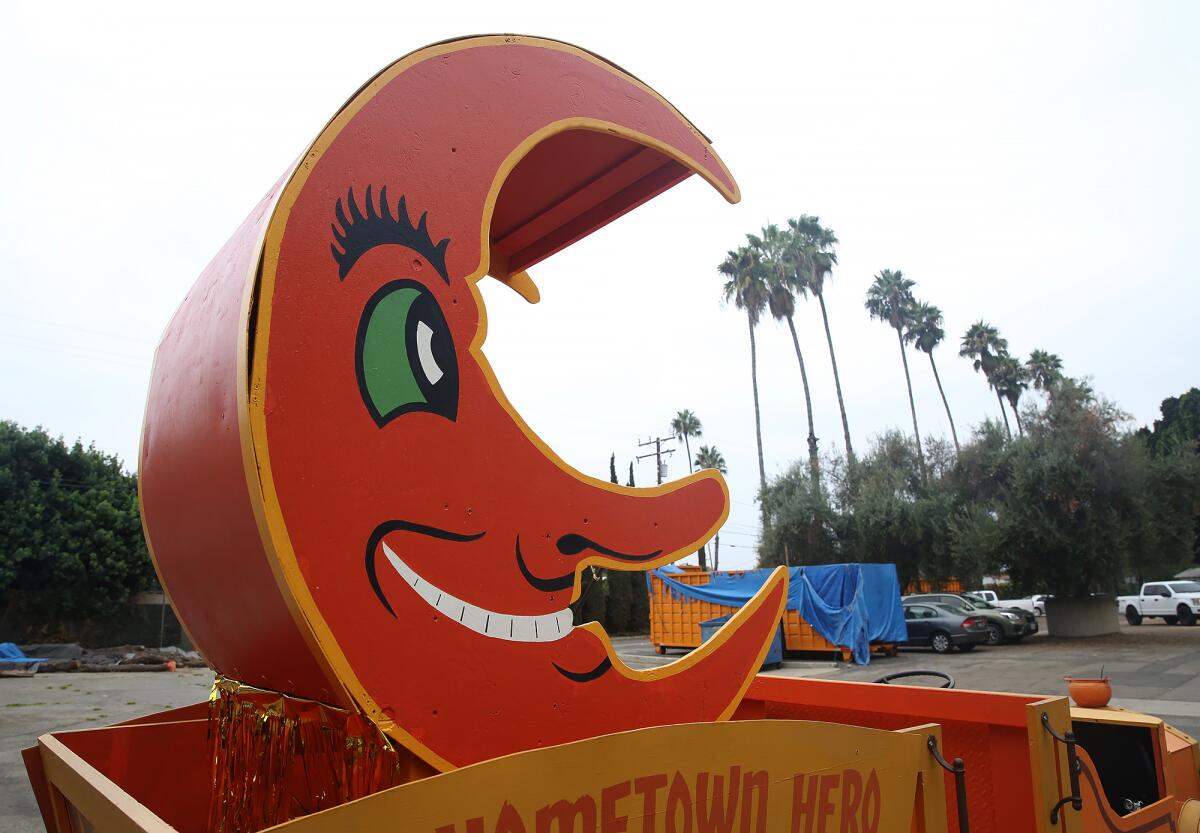 A vintage Halloween crescent moon awaits its parade route in Anaheim on Oct. 26