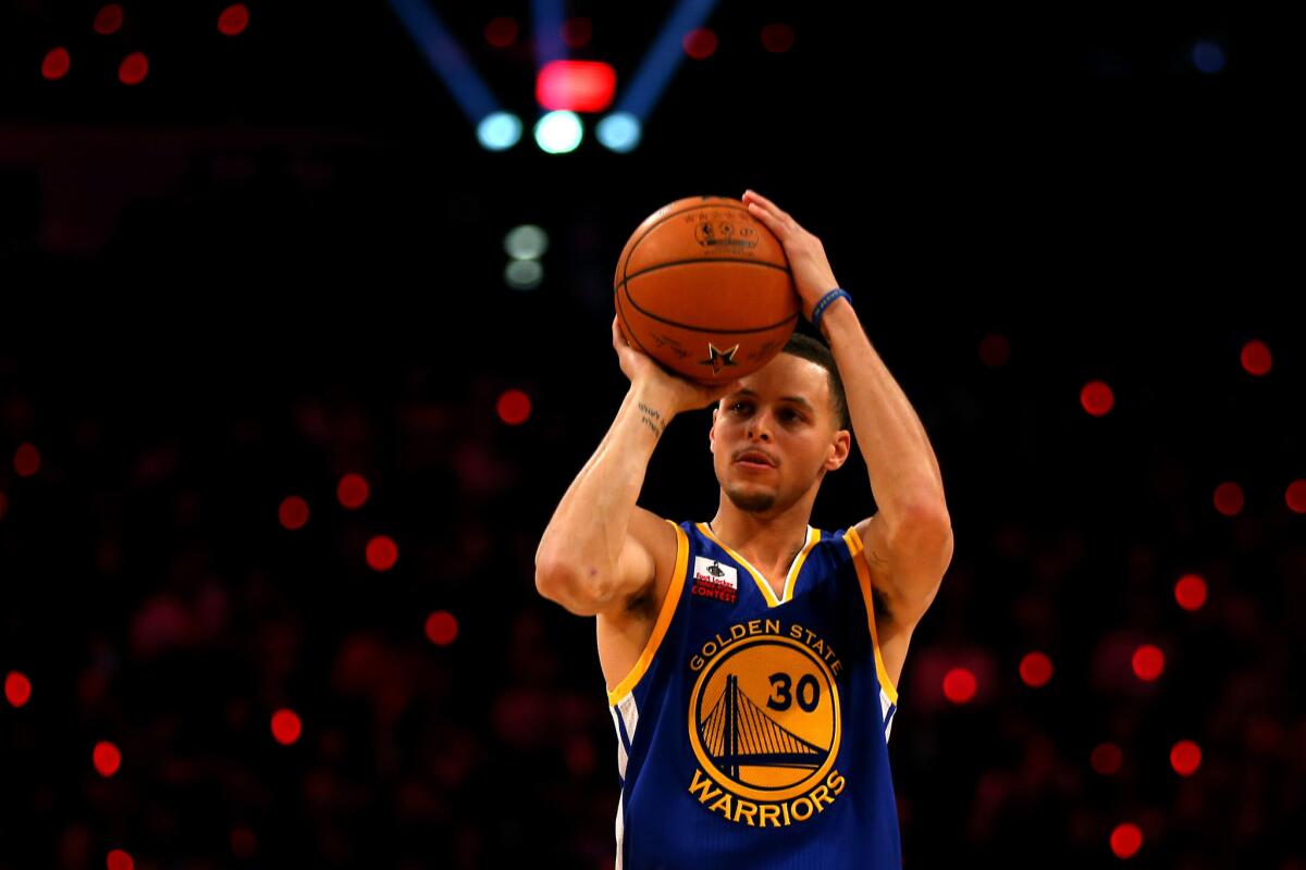 Warriors point guard Stephen Curry competes in the three-point contest during NBA All-Star weekend on Feb. 14 at the Barclays Center in Brooklyn, N.Y.