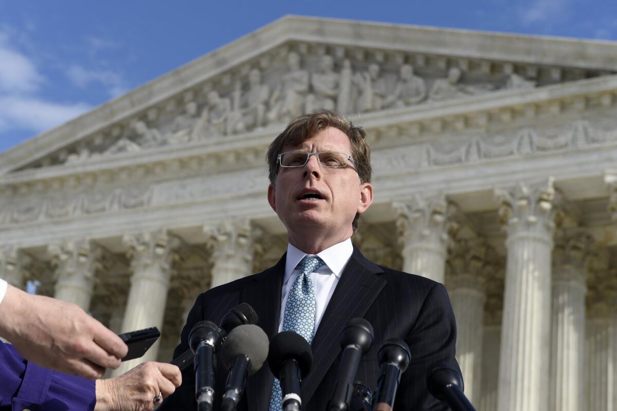 John P. Elwood, attorney for Anthony Elonis -- who claimed he was just kidding when he posted a series of graphically violent rap lyrics on Facebook -- speaks outside the Supreme Court on Dec. 1, 2014.