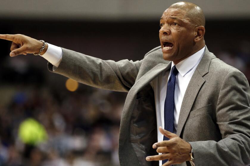 Los Angeles Clippers head coach Doc Rivers looks for a call during the first half as the Clippers take on the Dallas Mavericks on Monday.
