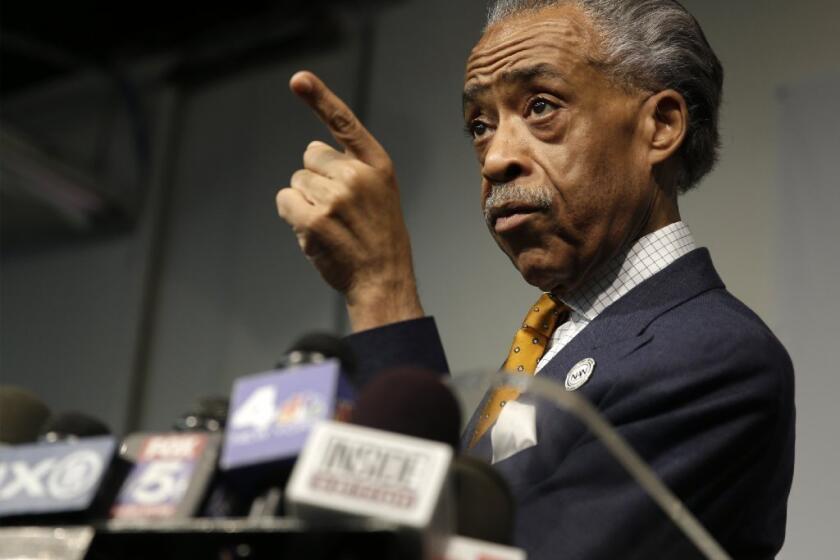 The Rev. Al Sharpton at a news conference at which he admitted working with the FBI to help catch mob figures in the 1980s. Sharpton said he was not a "rat" but rather a "cat" chasing bad guys.