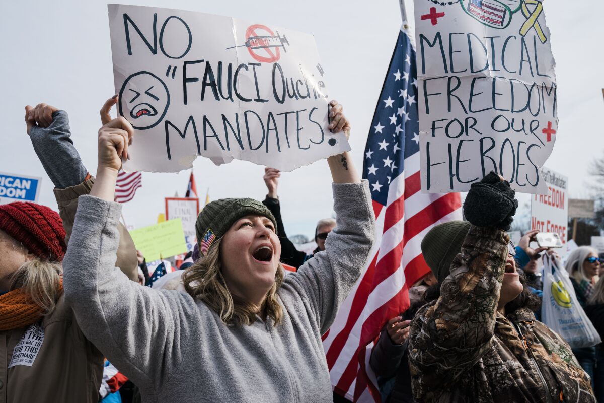 People cheer during a Defeat the Mandates Rally in Washington on Jan. 23. 