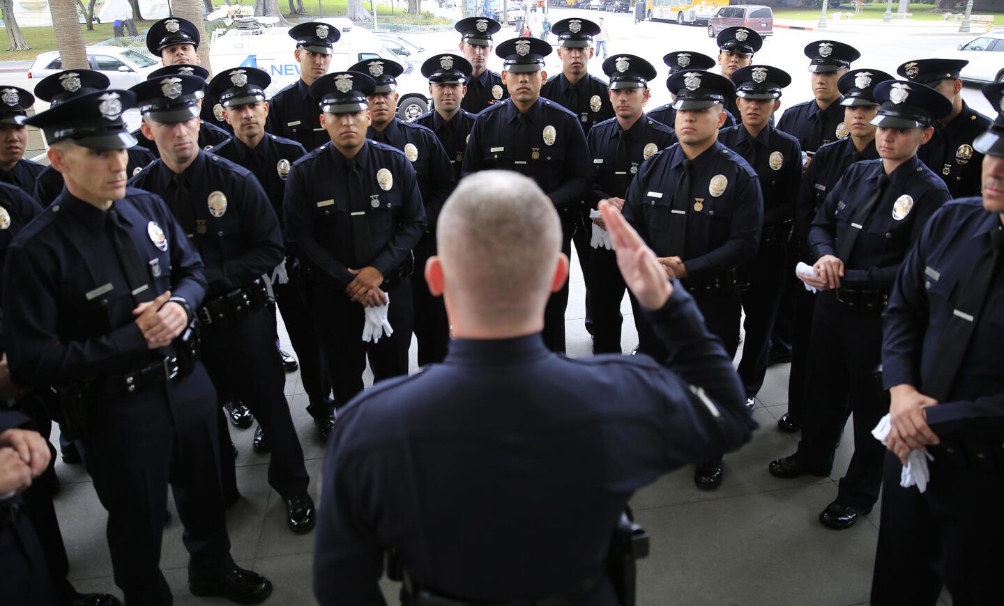 Drill instructor Adam Gross talks to LAPD officer recruits before their graduation in February.