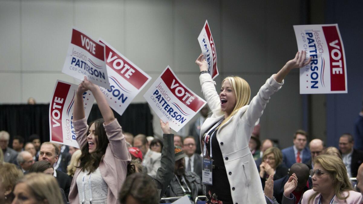 Backers show their support for Jessica Patterson at the state Republican Party convention in Sacramento.