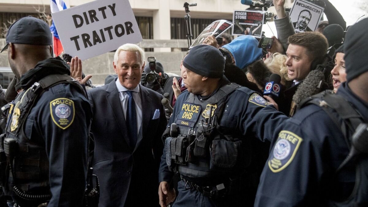 Roger Stone, who advised President Trump for years, arrives at federal court in Washington on Tuesday. He was arrested on Friday in the Russia investigation.