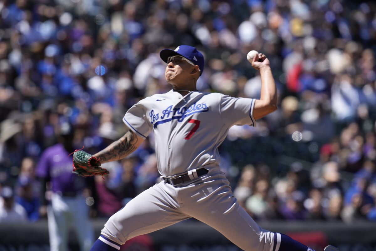 Dodgers starting pitcher Julio Urías delivers during the first inning Sunday.