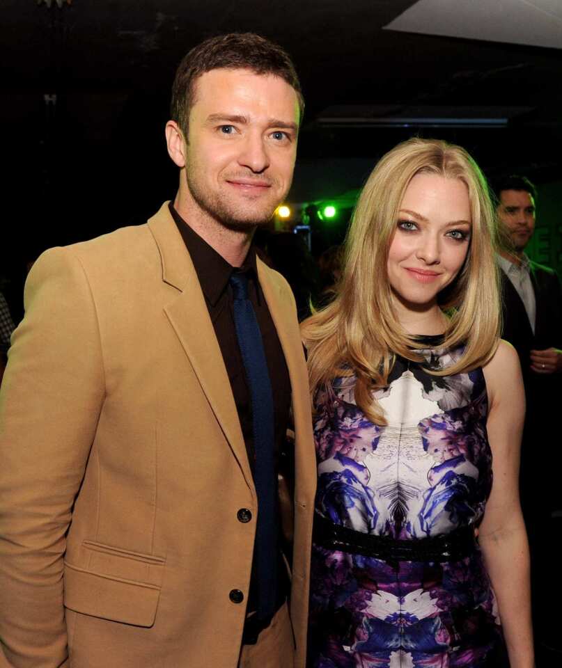 Costars Justin Timberlake and Amanda Seyfried took a time out to celebrate their new action thriller "In Time." In the movie, aging stops at 25 and time can be bought and sold.