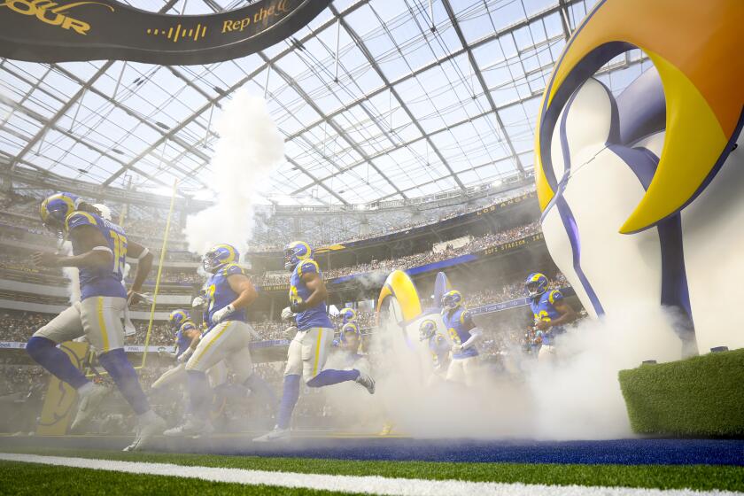 The Los Angeles Rams enter the field during an NFL football game Sunday, Oct. 6, 2024, in Inglewood, Calif. (AP Photo/Ryan Sun)