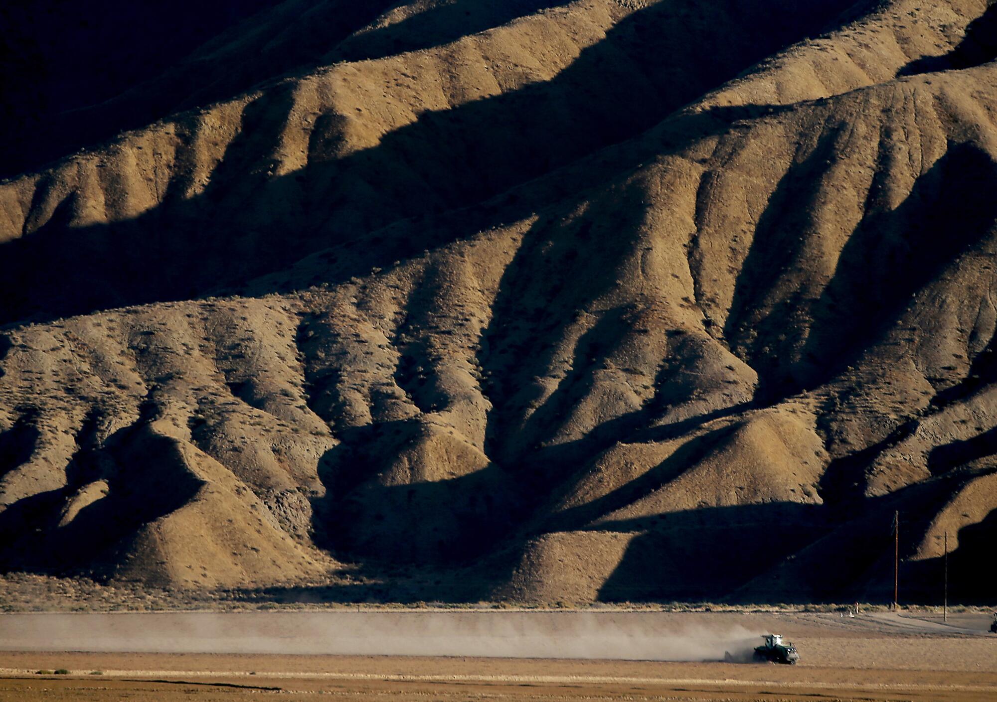A tractor plows a field in the Cuyama Valley in October.