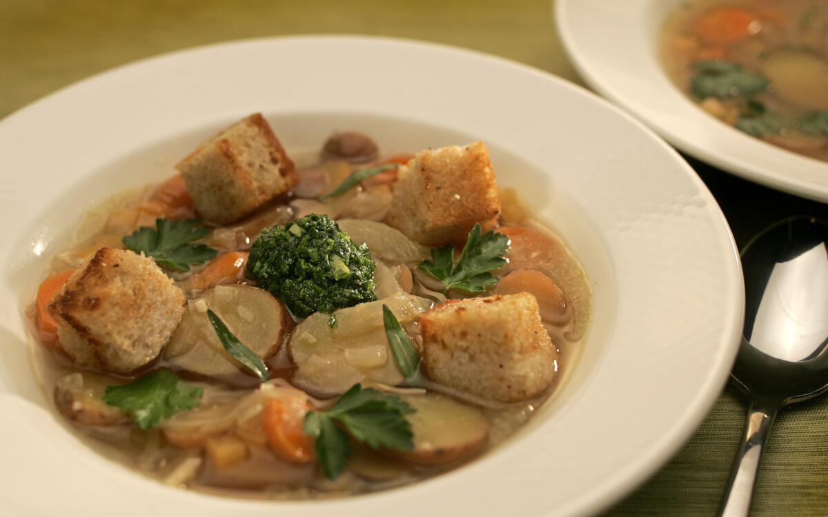 Rustic vegetable soup with rye croutons and parsley-savory 'pistou'