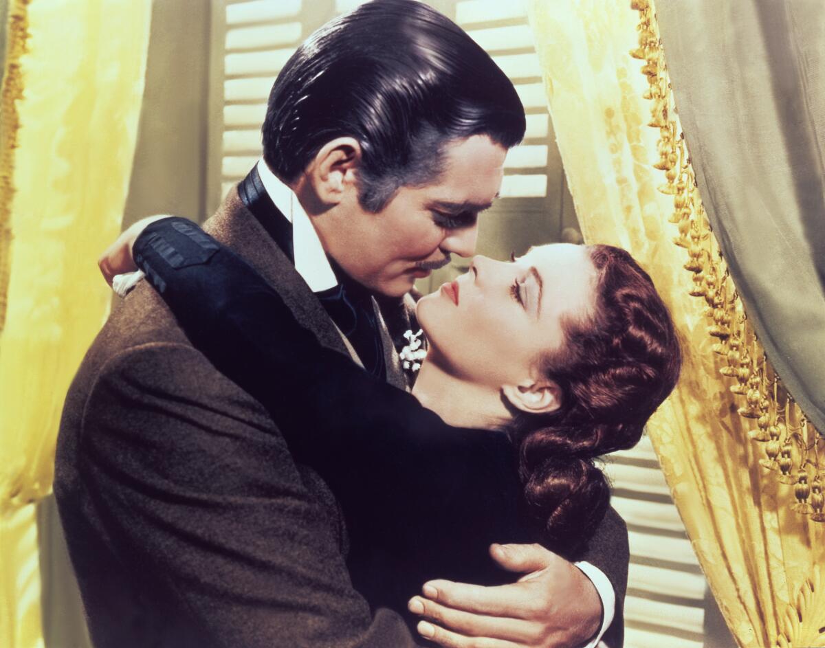 Clark Gable and Vivien Leigh embracing in 1939's “Gone With the Wind”