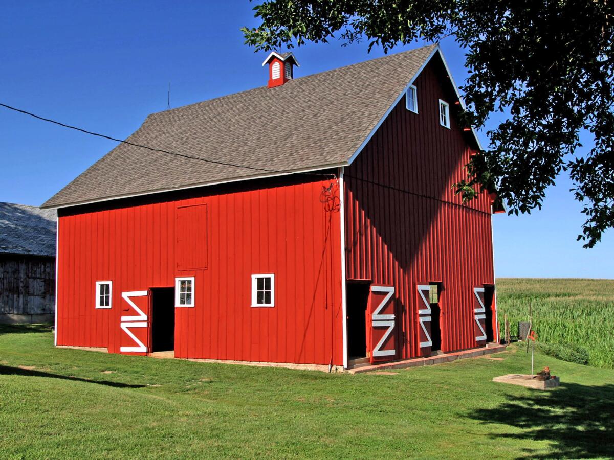 Conover barn, 5315 190th Street, Holstein (Ida County) - From Holstein travel 1.5 mile west on US 20. Turn south on L67 and go three miles. Turn left on 190th. It is the first place on north side of road. Barn was built around 1900 and used by C.B. Conover and his son, C.B., Jr., for their outstanding Belgian draft horses. Harry Linn, Iowa's secretary of agriculture, gave draft horse demonstrations here. (Award of Distinction).
