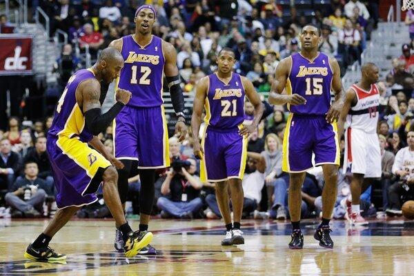 Kobe Bryant celebrates during the closing minutes of the Lakers' 102-96 win over the Washington Wizards at Verizon Center.