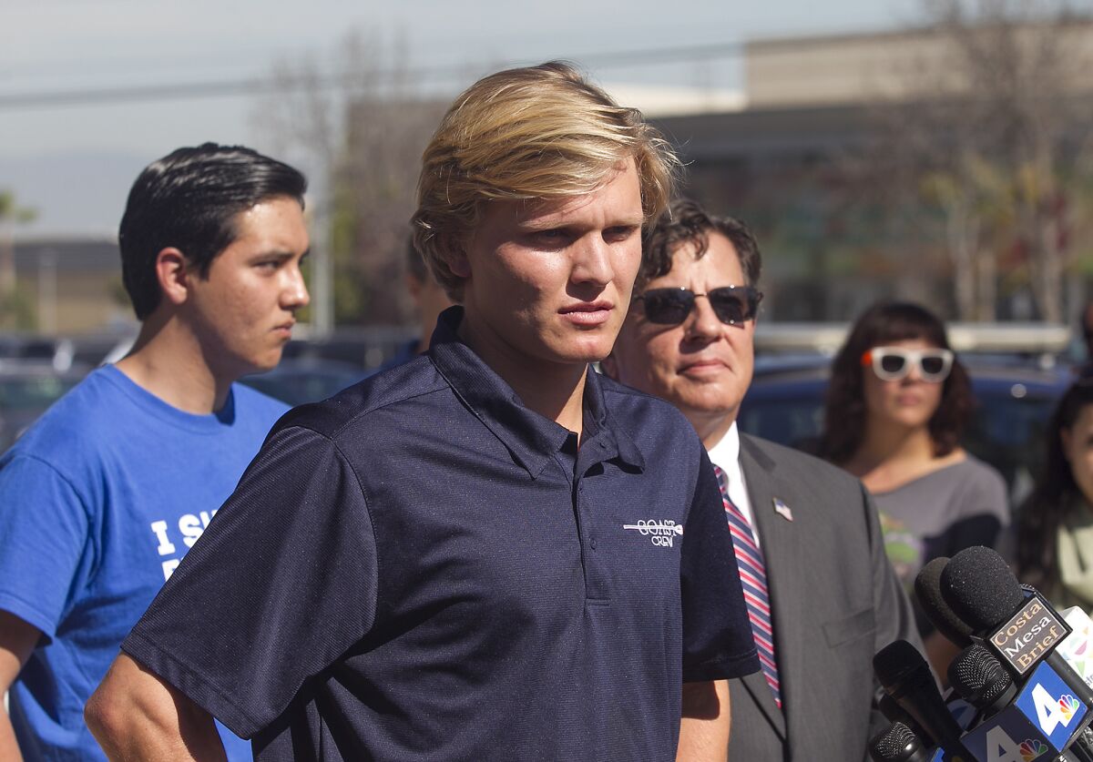 Orange Coast College student Caleb O’Neil speaks at a news conference Feb. 15 in which he addressed his in-class video recording of a professor making controversial remarks about President Trump.