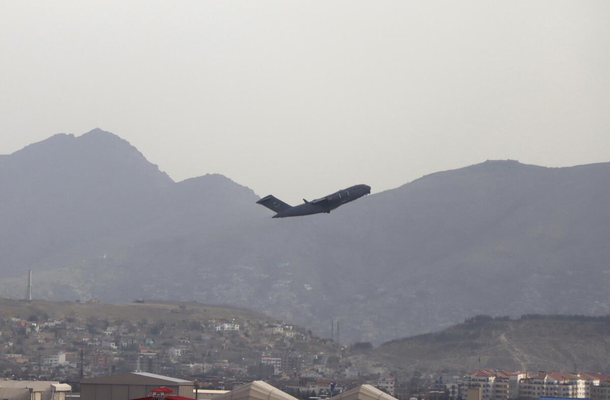 A U.S. military aircraft takes off from Hamid Karzai International Airport in Kabul, Afghanistan, on Aug. 30. 